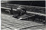 Detalle de construcción, obreros trabajando