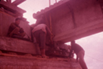 Detalle de construcción y obreros trabajando